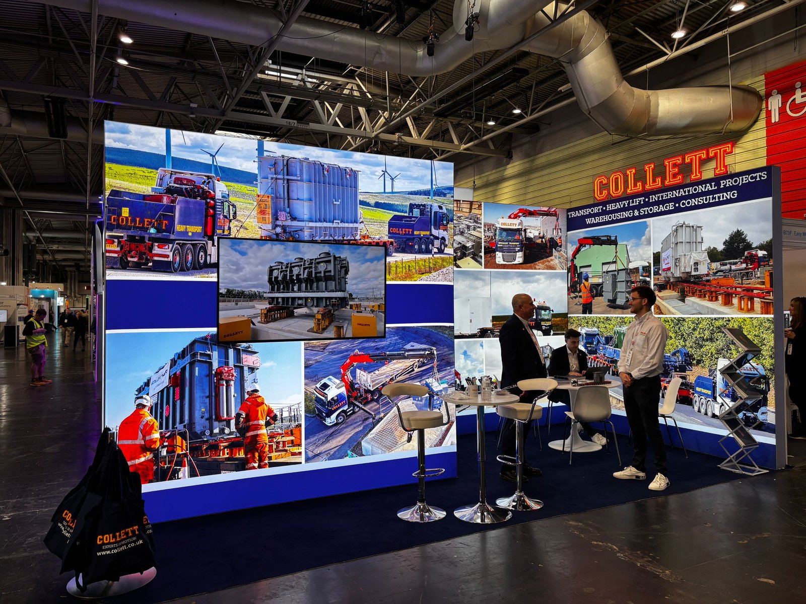 Collett & Sons exhibition stand with an illuminated logo at Solar & Storage Live 2025